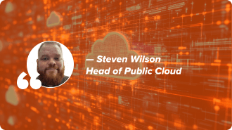 Steven Wilson’s headshot in front of a photo of EchoStar’s Public Cloud team.
