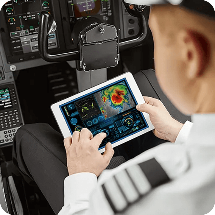Pilot checking live weather on tablet