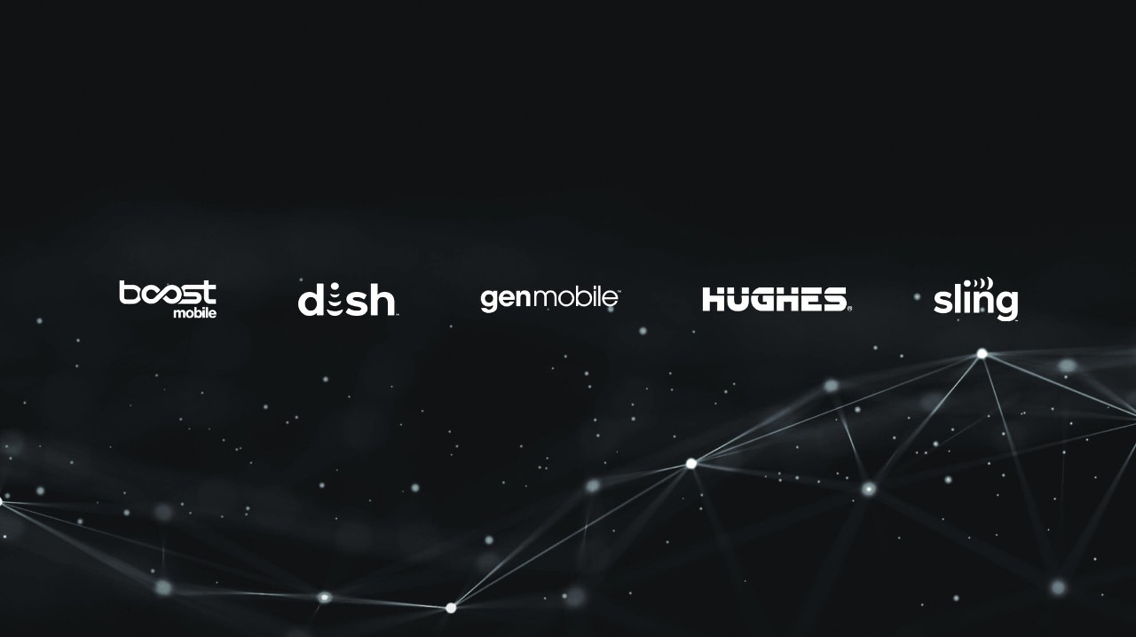 Headshot of Josh Watters in front of image of Hughes solutions.